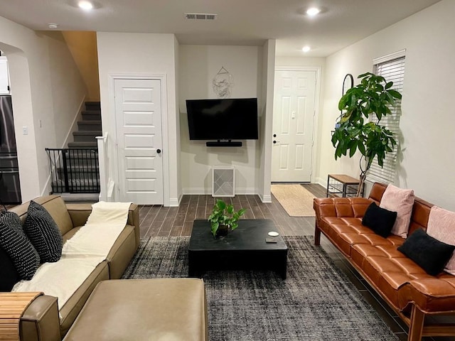 14217 Silver Lace Ln, Pflugerville, TX 78660 - living room with stairs, recessed lighting, and wood finished floors