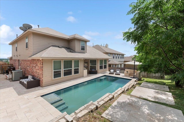 1366 Red Stag Pl, Round Rock, TX 78665 - back of house with a shingled roof, a patio area, a fenced backyard, and brick siding