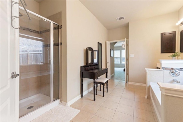 1366 Red Stag Pl, Round Rock, TX 78665 - full bath with a bath, a shower stall, and tile patterned floors