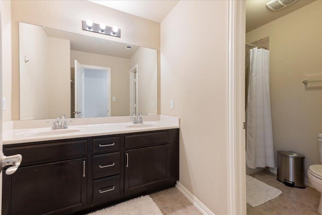 1366 Red Stag Pl, Round Rock, TX 78665 - bathroom with tile patterned floors, double vanity, and a shower with curtain