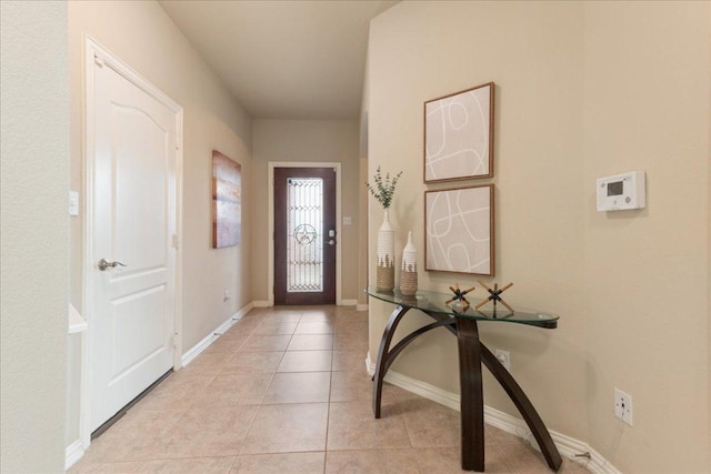 1366 Red Stag Pl, Round Rock, TX 78665 - foyer entrance featuring light tile patterned flooring and baseboards