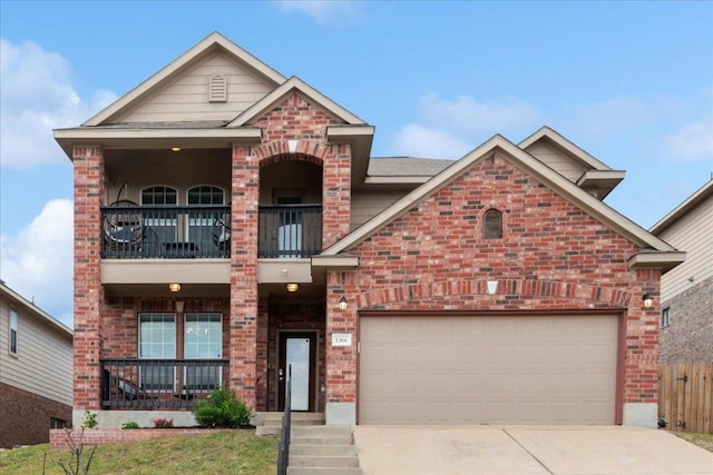 1366 Red Stag Pl, Round Rock, TX 78665 - craftsman-style house with a balcony, brick siding, concrete driveway, and an attached garage