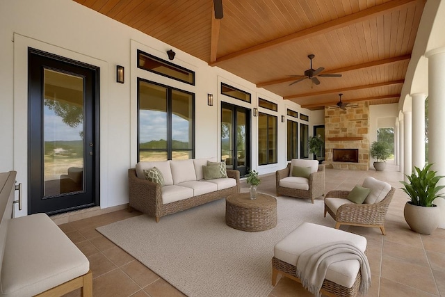 144 Serene St, Spring Branch, TX 78070 - view of patio / terrace with a ceiling fan and an outdoor living space with a fireplace