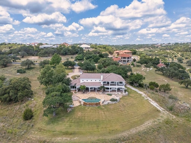144 Serene St, Spring Branch, TX 78070 - aerial view of property and surrounding area with a pool area and a tree filled landscape