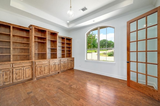 144 Serene St, Spring Branch, TX 78070 - unfurnished room featuring ornamental molding, a raised ceiling, and hardwood / wood-style floors