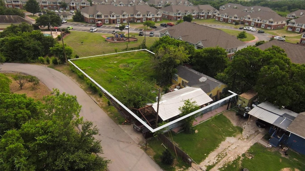 8010 N Lake Dr, Austin, TX 78724 - aerial perspective of suburban area featuring property parcel outlined