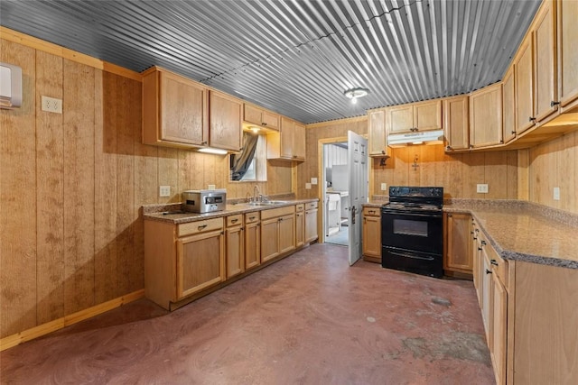 2951 County Road 360, Bartlett, TX 76511 - kitchen featuring electric range, under cabinet range hood, a sink, concrete floors, and wooden walls