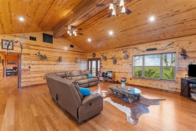2951 County Road 360, Bartlett, TX 76511 - living area featuring a ceiling fan, wooden walls, wood finished floors, wood ceiling, and french doors