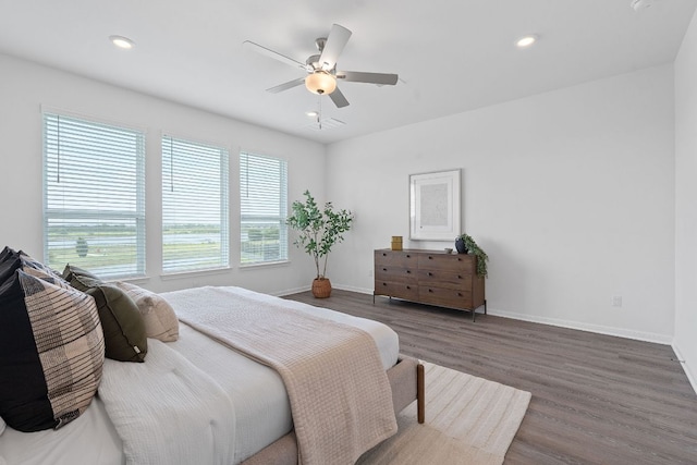 529 Leeward Pass, Leander, TX 78641 - bedroom with wood finished floors, ceiling fan, and recessed lighting