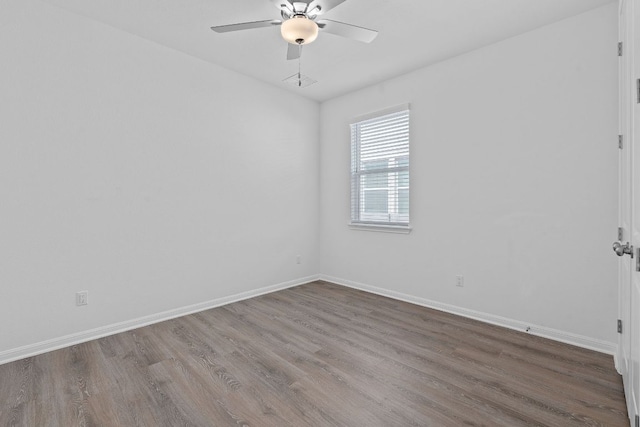 529 Leeward Pass, Leander, TX 78641 - unfurnished room featuring wood finished floors and ceiling fan