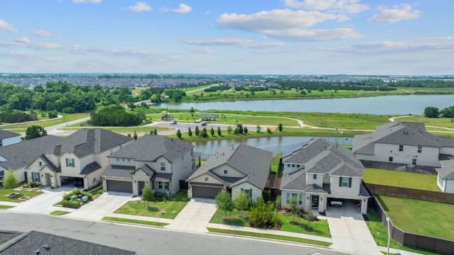 529 Leeward Pass, Leander, TX 78641 - aerial perspective of suburban area with a nearby body of water