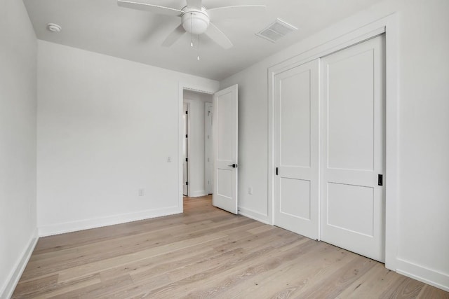 4127 E 12th St Unit 5, Austin, TX 78721 - unfurnished bedroom featuring light wood finished floors, a closet, and a ceiling fan