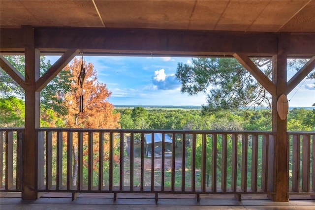 121 Kaelepulu Dr, Bastrop, TX 78602 - wooden terrace with a view of trees