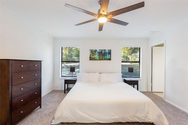 121 Kaelepulu Dr, Bastrop, TX 78602 - bedroom featuring light colored carpet and a ceiling fan