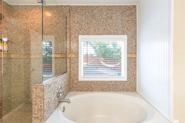 121 Kaelepulu Dr, Bastrop, TX 78602 - full bathroom featuring a bath and a tile shower