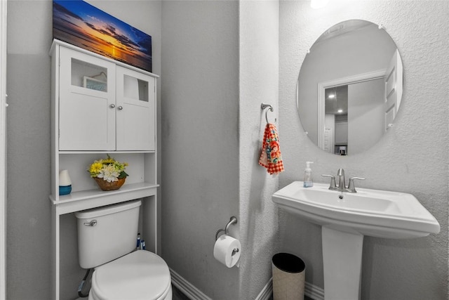 12705 Twisted Root Dr, Manchaca, TX 78652 - bathroom with toilet and a sink