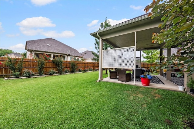 12705 Twisted Root Dr, Manchaca, TX 78652 - fenced backyard featuring a patio area and an outdoor living space