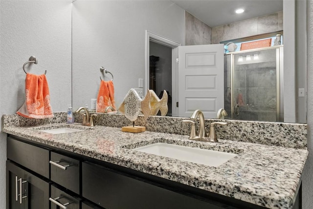 12705 Twisted Root Dr, Manchaca, TX 78652 - bathroom with double vanity and a stall shower
