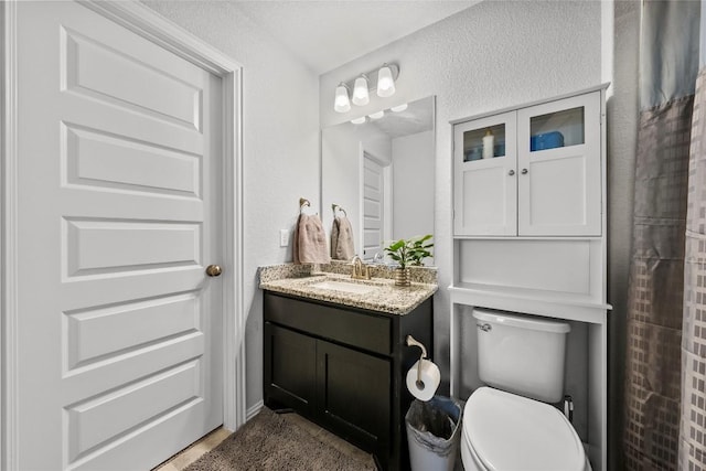 12705 Twisted Root Dr, Manchaca, TX 78652 - bathroom featuring vanity and toilet