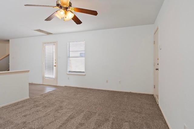 2840 Deerfern Ln, Round Rock, TX 78665 - spare room featuring carpet floors, ceiling fan, and baseboards