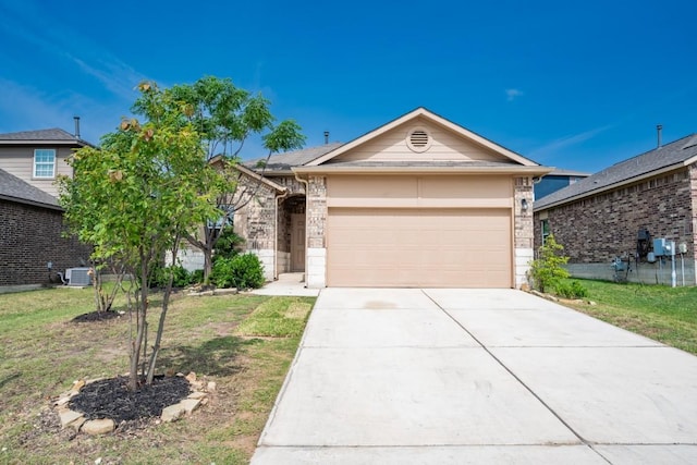 1605 Atlas Rd, Cedar Park, TX 78613 - view of front of house with central AC, a garage, driveway, brick siding, and a front lawn