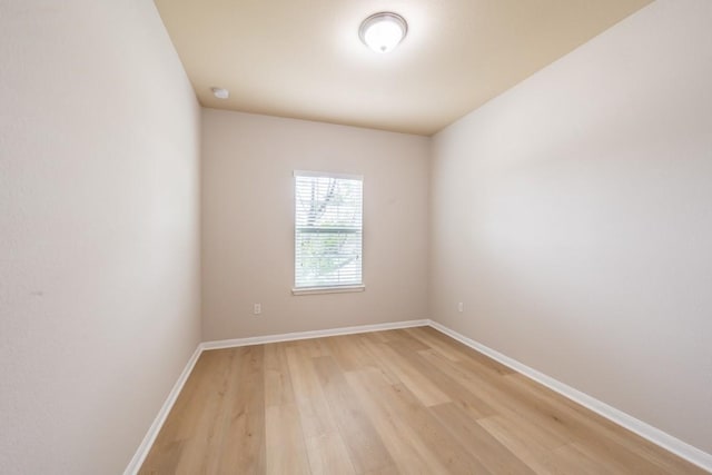 1605 Atlas Rd, Cedar Park, TX 78613 - spare room featuring light wood finished floors, baseboards, and a smoke detector
