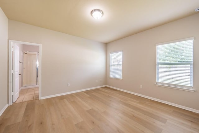 1605 Atlas Rd, Cedar Park, TX 78613 - spare room with light wood-style floors and baseboards