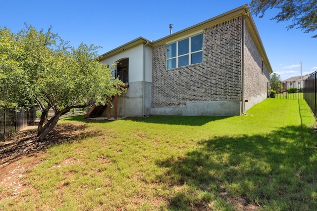 609 Glacial Stream Ln, Cedar Park, TX 78613 - rear view of property featuring brick siding