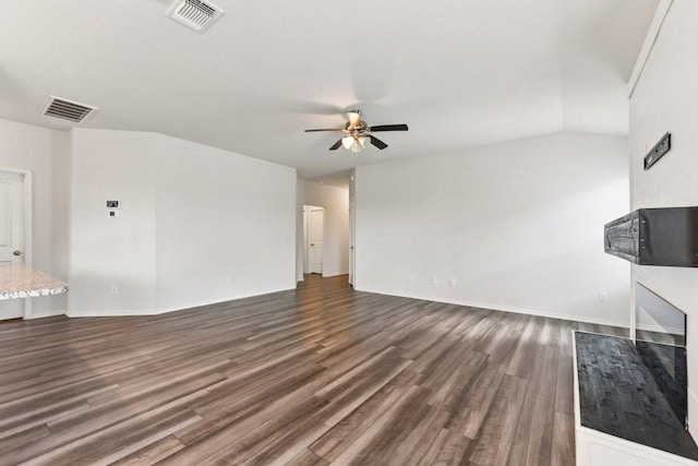 133 Nathaniel Dr, Taylor, TX 76574 - unfurnished living room with ceiling fan and dark wood-style flooring