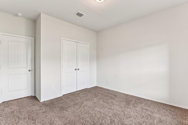 133 Nathaniel Dr, Taylor, TX 76574 - unfurnished bedroom with carpet flooring and a closet
