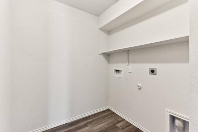 133 Nathaniel Dr, Taylor, TX 76574 - washroom with hookup for a gas dryer, hookup for a washing machine, electric dryer hookup, and dark wood-style floors