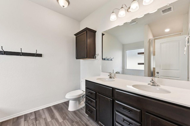 133 Nathaniel Dr, Taylor, TX 76574 - full bath featuring double vanity, wood finished floors, and a shower