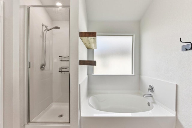 133 Nathaniel Dr, Taylor, TX 76574 - full bathroom featuring a shower stall and a garden tub