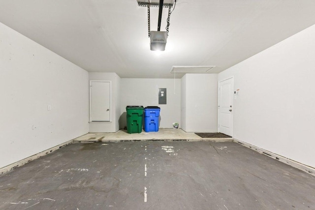 133 Nathaniel Dr, Taylor, TX 76574 - garage with electric panel and a garage door opener