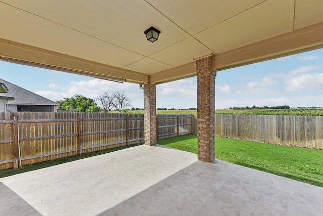 133 Nathaniel Dr, Taylor, TX 76574 - fenced backyard with a patio