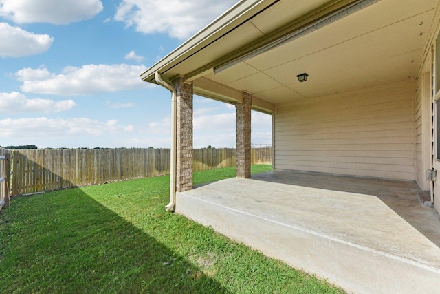 133 Nathaniel Dr, Taylor, TX 76574 - fenced backyard featuring a patio area