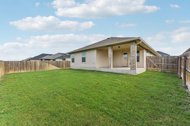 133 Nathaniel Dr, Taylor, TX 76574 - back of house with a patio area and a fenced backyard