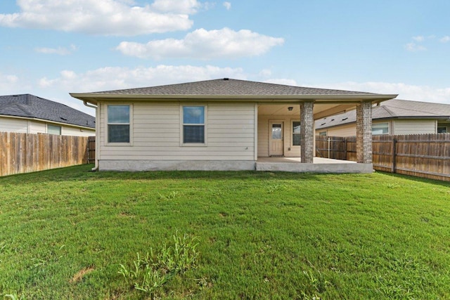 133 Nathaniel Dr, Taylor, TX 76574 - back of house with a patio and a fenced backyard