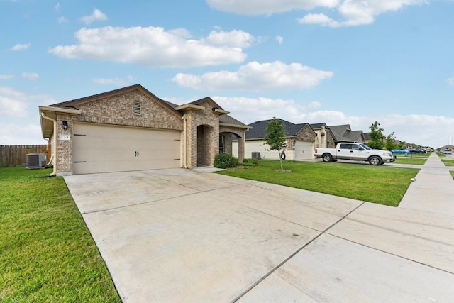 133 Nathaniel Dr, Taylor, TX 76574 - french provincial home featuring concrete driveway, an attached garage, and brick siding