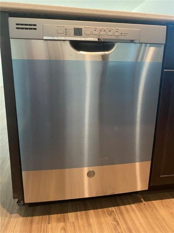 105 Akela Way, Georgetown, TX 78626 - kitchen view of stainless steel dishwasher and light wood-style floors