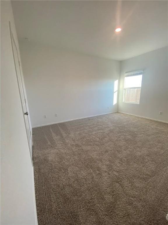 105 Akela Way, Georgetown, TX 78626 - empty room with carpet, baseboards, and recessed lighting