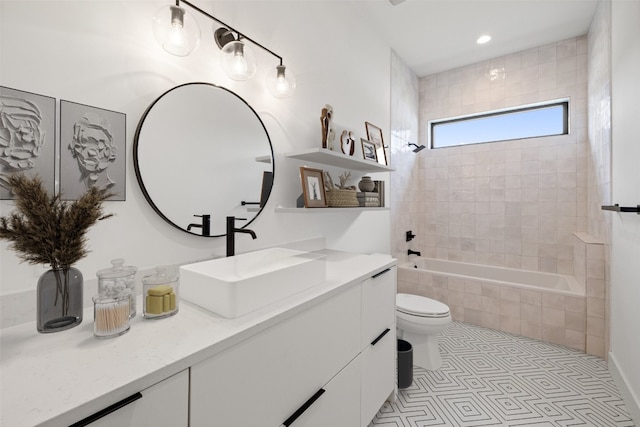 201 Custers Last Stand, Horseshoe Bay, TX 78657 - bathroom featuring toilet, vanity, tiled shower / bath combo, and recessed lighting