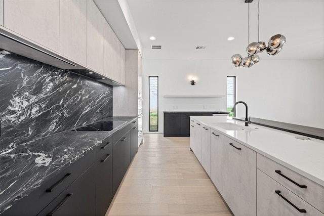 201 Custers Last Stand, Horseshoe Bay, TX 78657 - kitchen featuring a sink, plenty of natural light, modern cabinets, and recessed lighting