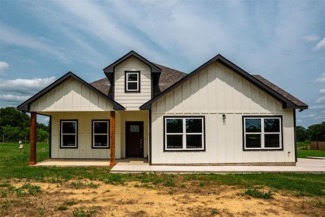 367 Stockade Ranch Rd, Paige, TX 78659 - view of front of house with board and batten siding and a shingled roof