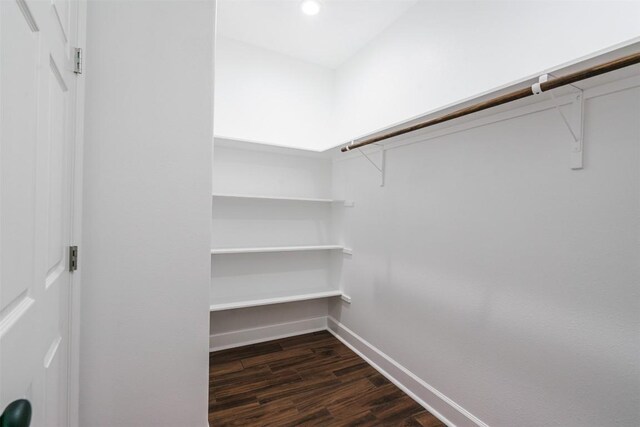 367 Stockade Ranch Rd, Paige, TX 78659 - spacious closet featuring dark wood-type flooring