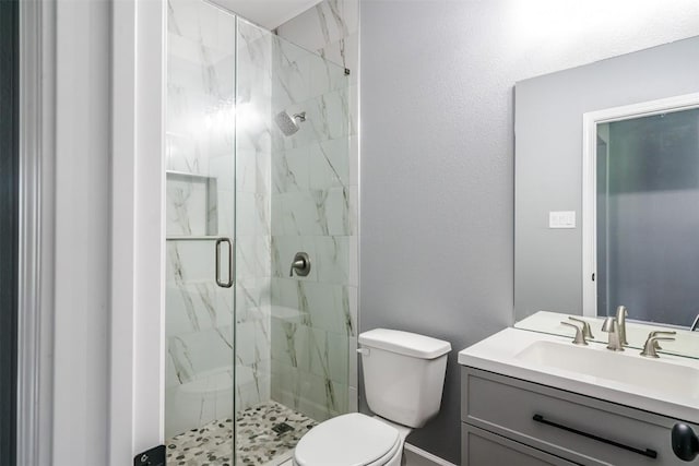 367 Stockade Ranch Rd, Paige, TX 78659 - bathroom featuring a marble finish shower, toilet, and vanity