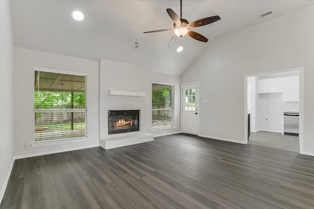 501 Maple Run, Round Rock, TX 78664 - unfurnished living room featuring a ceiling fan, high vaulted ceiling, a fireplace, baseboards, and dark wood-style floors