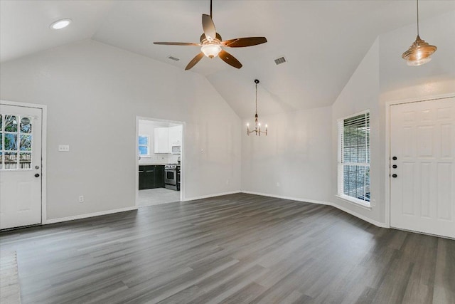 501 Maple Run, Round Rock, TX 78664 - entryway with a chandelier, ceiling fan, high vaulted ceiling, dark wood finished floors, and baseboards