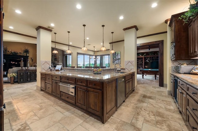 104 Porto Cima Ct, Austin, TX 78738 - kitchen with a warming drawer, stone tile flooring, ornamental molding, dishwasher, and decorative backsplash