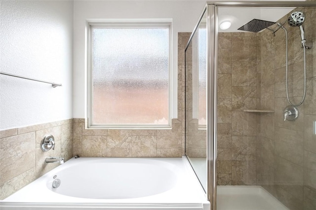 111 Colthorpe Ln, Hutto, TX 78634 - bathroom with a stall shower and a garden tub